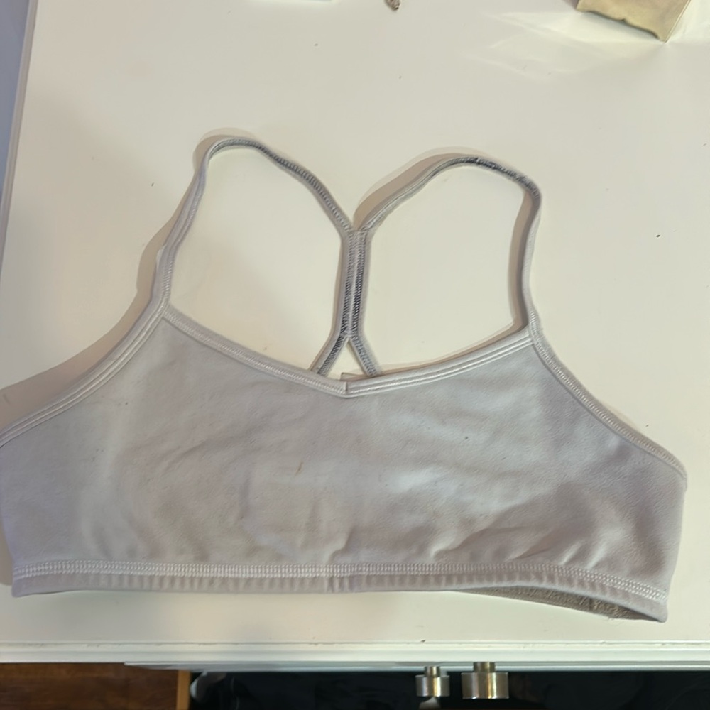 A white Ivivva sports bra